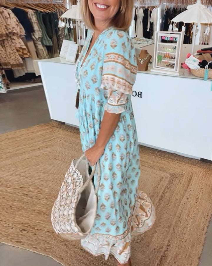 Cherry | Patterned midi dress with V-neck and balloon sleeves Elegant