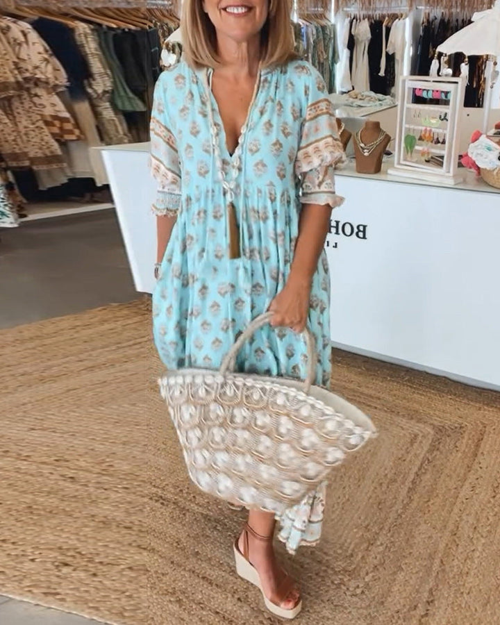Cherry | Patterned midi dress with V-neck and balloon sleeves Elegant