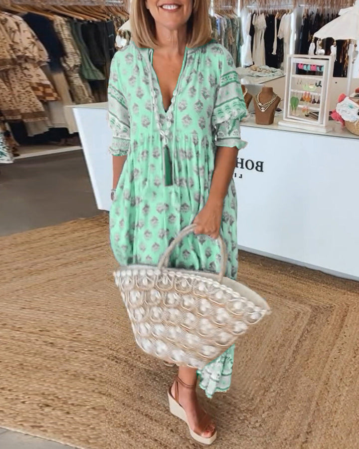 Cherry | Patterned midi dress with V-neck and balloon sleeves Elegant