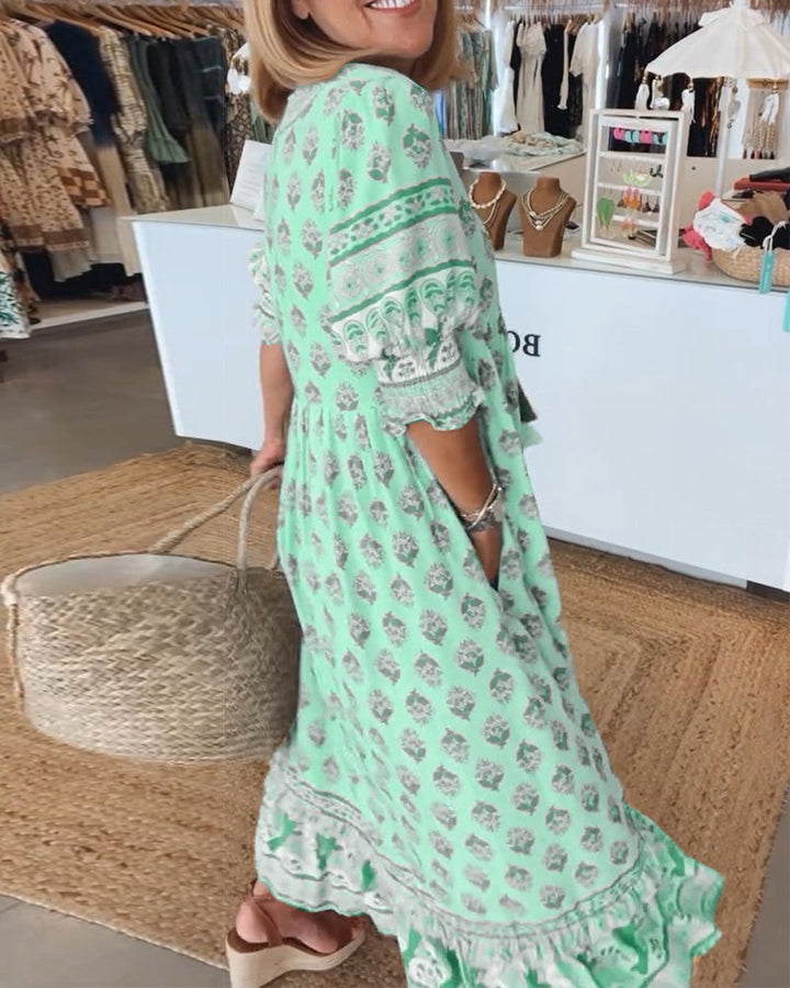 Cherry | Patterned midi dress with V-neck and balloon sleeves Elegant