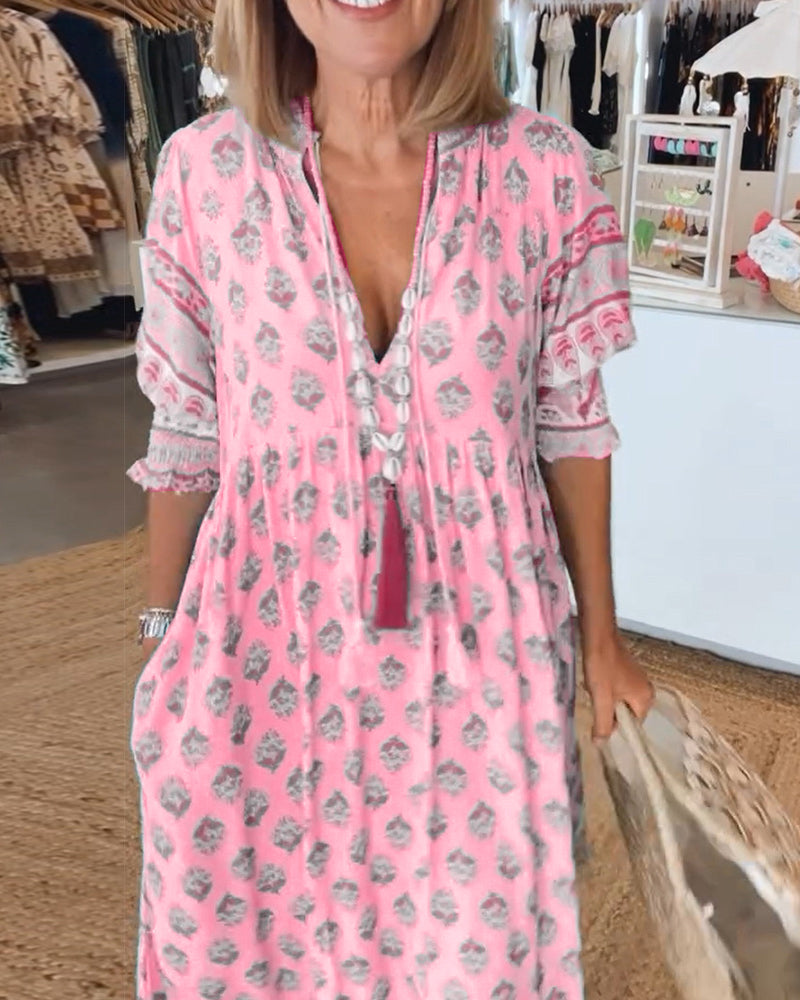 Cherry | Patterned midi dress with V-neck and balloon sleeves Elegant