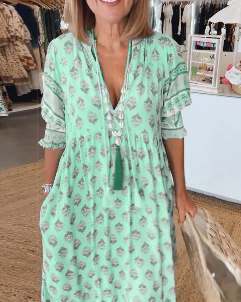 Cherry | Patterned midi dress with V-neck and balloon sleeves Elegant