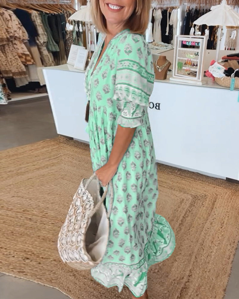 Cherry | Patterned midi dress with V-neck and balloon sleeves Elegant