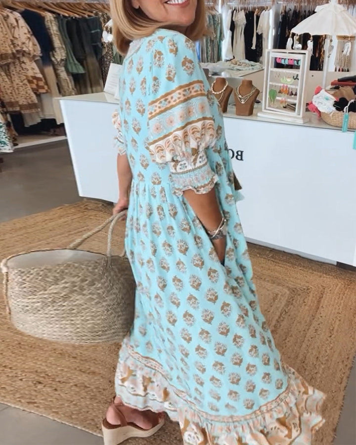 Cherry | Patterned midi dress with V-neck and balloon sleeves Elegant