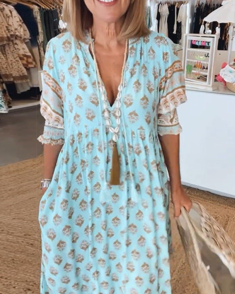 Cherry | Patterned midi dress with V-neck and balloon sleeves Elegant